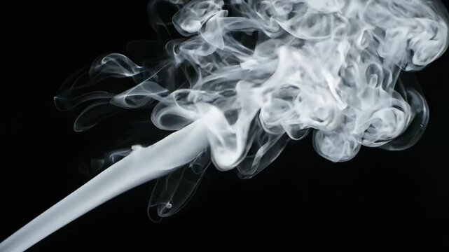 Close-up of Smoke Swirling in Dark Background.