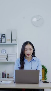  The couple is planning their trip and booking accommodations online while sitting at home on the sofa. They use their laptops to plan their itinerary, check flights, 