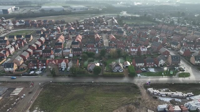 Aerial View of Suburban Housing Estate Bordering Open Fields in Barton Seagrave England
