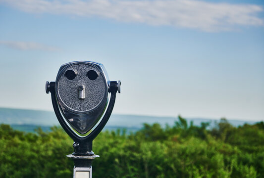 oin-operated landscape viewer overlooking big Pocono State Park, located atop Camelback Mountain in Tannersville, Pennsylvania.