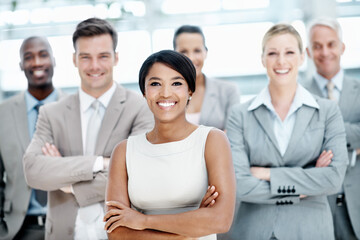 Fototapeta premium Arms crossed, portrait or business people with group in lobby for career, about us or financial conference. Consultant, team and proud advisor in office with ambition, corporate event or opportunity