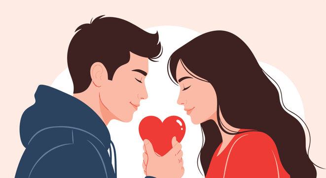 Romantic young couple in profile looking into each other eyes while holding a red heart symbol of love and affection together.