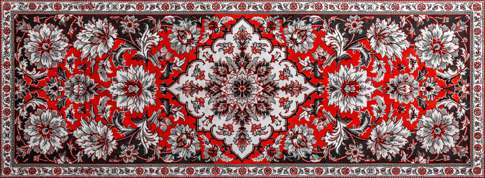 Traditional oriental persian runner rug with intricate floral patterns and central medallion in red black and white for home interior decoration