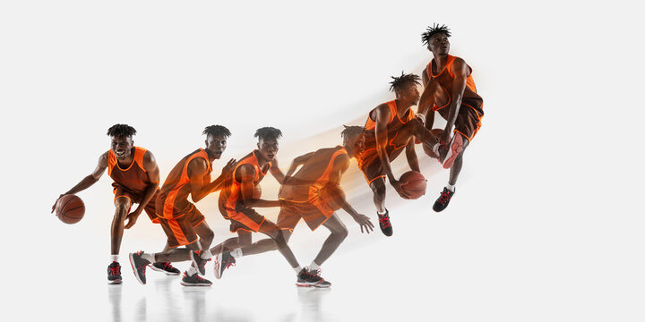 Basketball player dribbling and jumping with motion sequence on white background. Concept of basketball training campaigns, dynamic athlete movement, sportswear promotion and athlete development.