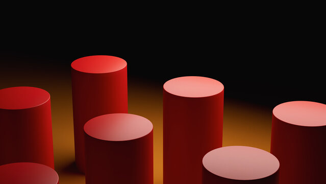 A collection of red cylindrical objects arranged on a warm, glowing surface against a dark background. Copy space. 