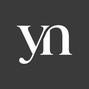 Modern serif typography monogram yn on dark background