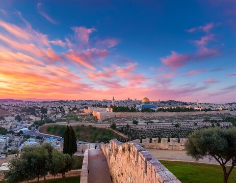beautiful pink and blue sunrise over the old city of jerusalem israel old city walls and dome of the rock in view from the mount of olives