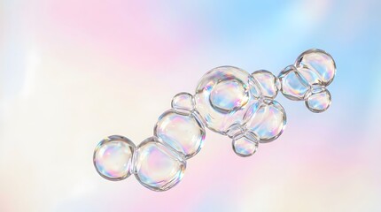 Obraz premium Translucent soap bubbles with iridescent rainbow reflections cluster together in a delicate formation to create a beautiful and artistic visual display.