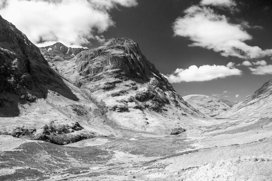 Dramatic view of Bidean nam Bian, one of the high peaks of Glen Coe in the Scottish Highlands, in Black and White. 