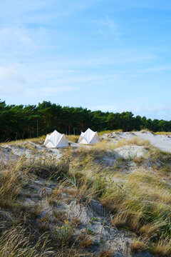 Two tents at a campground on the Baltic Sea coast in the sand dunes on the Dar&szlig; Peninsula