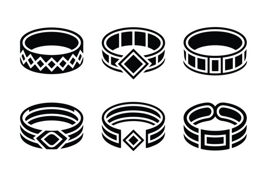 Collection of six different black and white metal wristband designs with geometric patterns