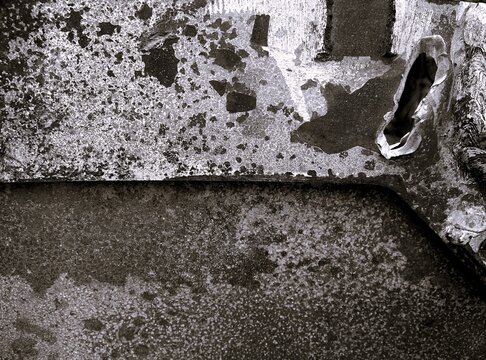 Black and white height map texture of damaged military BMP armor with shrapnel hits and bullet holes.