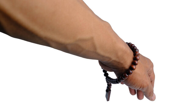 Wooden Prayer Beads Tasbih Worn as Bracelet on Wrist Isolated