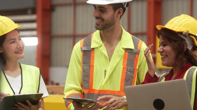 Supervisors inspecting production workflow and monitoring factory operations with digital technology. Manufacturing management, industrial innovation and operational efficiency.