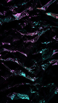 Dark Purple and Teal Crumpled Metallic Foil Abstract Background with Moody Iridescent Texture on Black