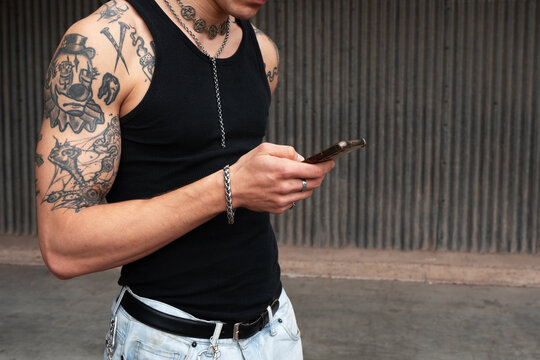 Checking smartphone in industrial urban environment