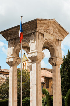 French War Memorial with Tricolor Flag in Grasse