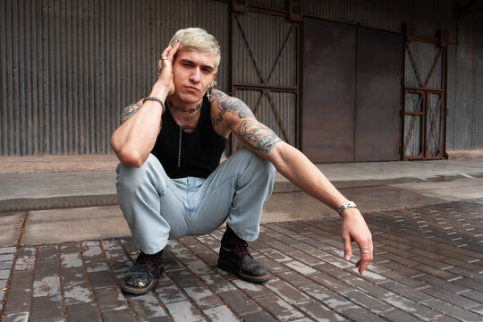 Casual Portrait Against Corrugated Metal Wall