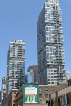 OOH wallscape with advertising for beverages on the exterior of the Gelber Building, 221 Richmond St W, Toronto (condo towers: Studio on Richmond)