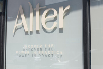 Obraz premium vinyl window sign at Alter, a wellness center, located at 860 College St, Toronto