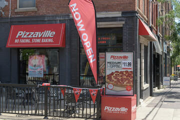 Obraz premium exterior building patio and signage of Pizzaville located here at 796 College St, Toronto