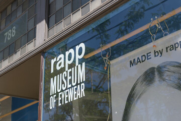 Obraz premium exterior building window and vinyl sign at Rapp Optical Ltd, an optician, located at 788 College St, Toronto