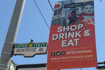 Obraz premium pole-mounted city and bia banner in Toronto's Little Italy