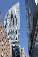 Obraz premium view of L-Tower designed by Daniel Libeskind from Bay St and lane south of the Dominion Public Building and CIBC Square, Toronto 
