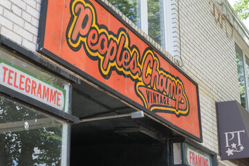 Obraz premium ghost sign (?) of People's Champ Vintage located at 709 College St, Toronto