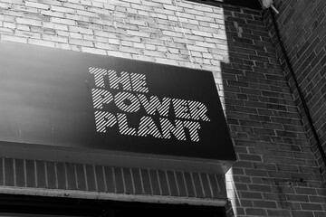 Obraz premium black and white view of sign outside The Power Plant, or The Power Plant Contemporary Art Gallery, Harbourfront Centre’s converted 1920s power station, showcasing contemporary art, Toronto
