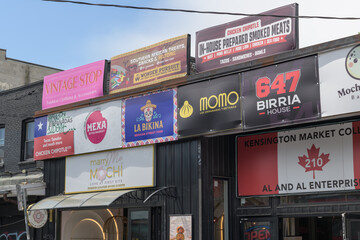Obraz premium various signs in Kensington Market around 210 Augusta Av, Toronto