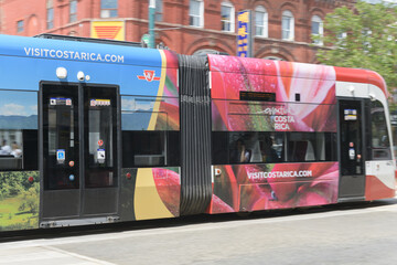 Obraz premium streetcar wrap travel advertisement for Costa Rica, Toronto