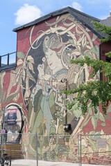 Obraz premium wide view of “Poetess Nouveau” located on the side wall at 71 Oxford St W, Kensington Market, Toronto