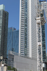 Obraz premium crane at Q Tower construction site and condo building at 10 York Street, Toronto