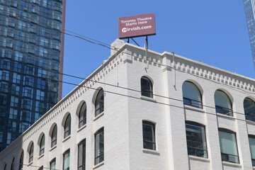 Obraz premium rooftop billboard advertisement and promotion of Toronto theatre atop Mirvish Productions (Administrative Office) 322 King St W