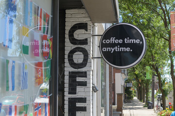Obraz premium wall-mounted round projecting sign at The Citrus Espresso Bar located at 1104 College St, Toronto