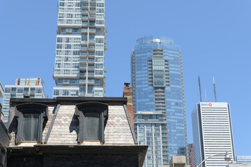 Obraz premium historic structure featuring a mansard roofline, condo building, hotel, and office tower, Toronto