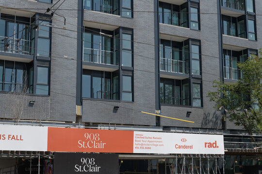 banner sign outside 908 St Clair condominium complex, Toronto