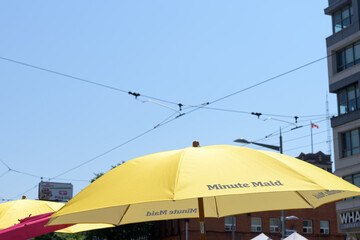 Obraz premium Minute Maid beverage brand event umbrella at Salsa on St Clair, Toronto (morning, 11 July 2026)