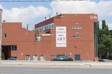 Obraz premium modern brick building and location of Designers Walk, an interior designer complex, at 168 Bedford Rd, north of Davenport Rd, Toronto