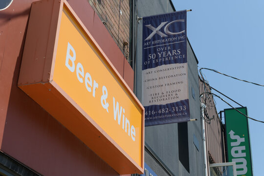 business signs and a projecting banner outside XC Art Restoration Inc located at 270 Dupont St, Toronto