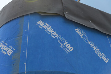 Obraz premium in situ example of Henry Blueskin VP100, a self-adhered, vapor-permeable air/water barrier membrane for exterior walls, sealing buildings against moisture and air leaks, Toronto
