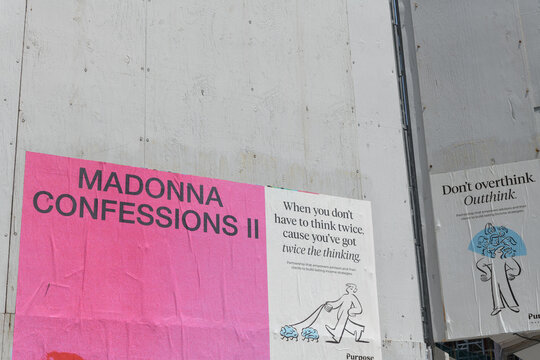 wheatpaste posters in Toronto (Madonna Confessions II and Purpose Investments)