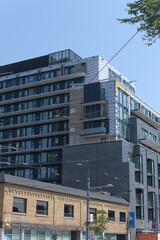 Obraz premium historic building (location of Toronto Western Family Health Team – Garrison Creek site) and 908 St Clair Condos, Toronto