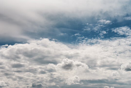 Layered clouds in a blue sky
