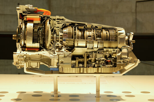 Car transmission cross section view with electric motor hybrid gearbox mechanism