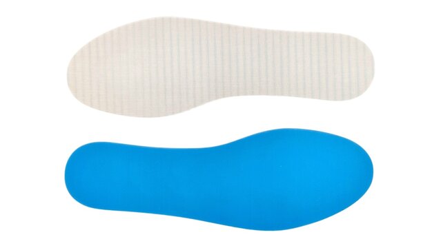 Top view of a pair of blue and white memory foam shoe insoles, isolated on white background.