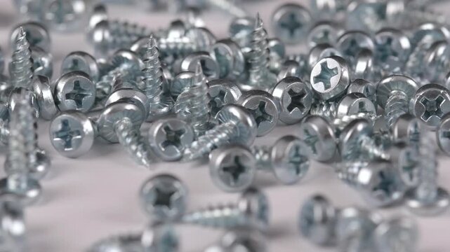 Metal screws for fastening equipment. Soft focus. Close-up. 
