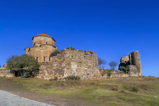 Jvari Monastery near Mtskheta, Georgia, medieval cross-in-square architecture style. Sunny day with clear blue sky
