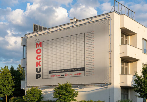 Billboard Mockup on the Side of an Apartment Condo Building